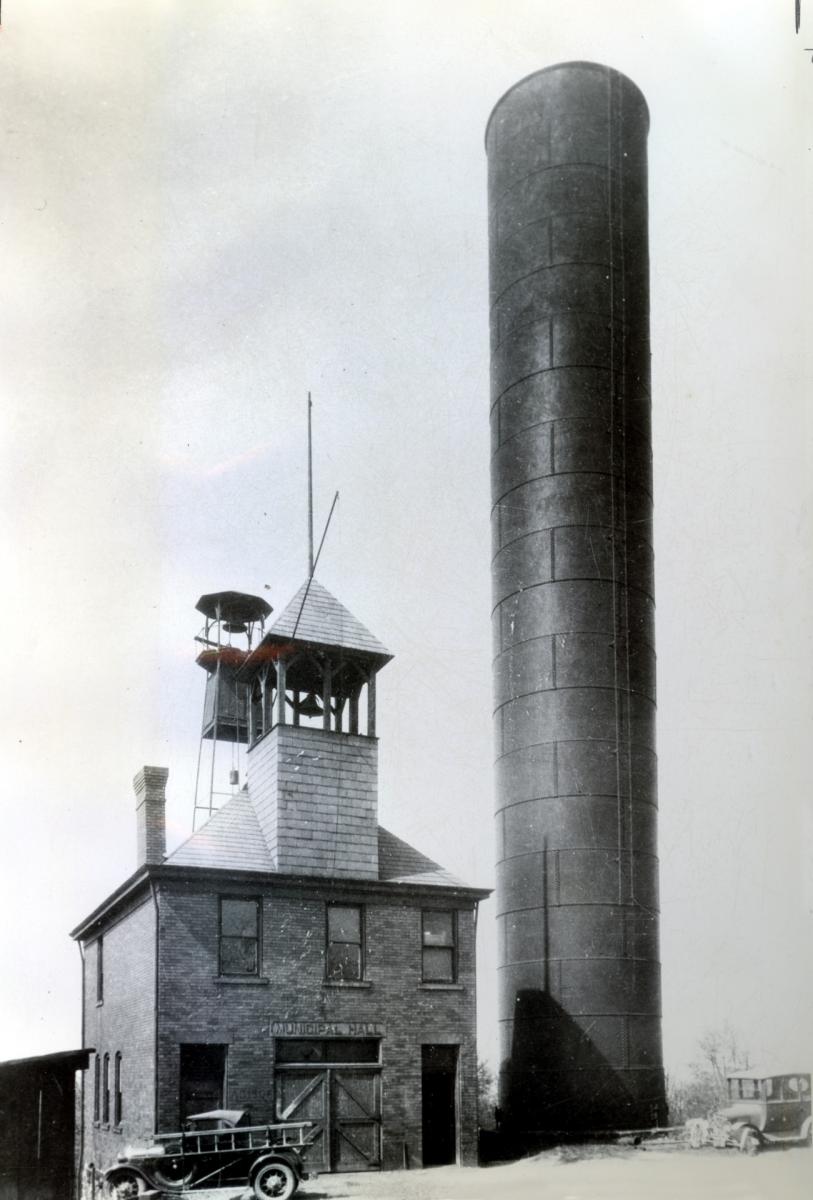 an early picture of the Ridgewood (No. 1) fire station with its large water tank